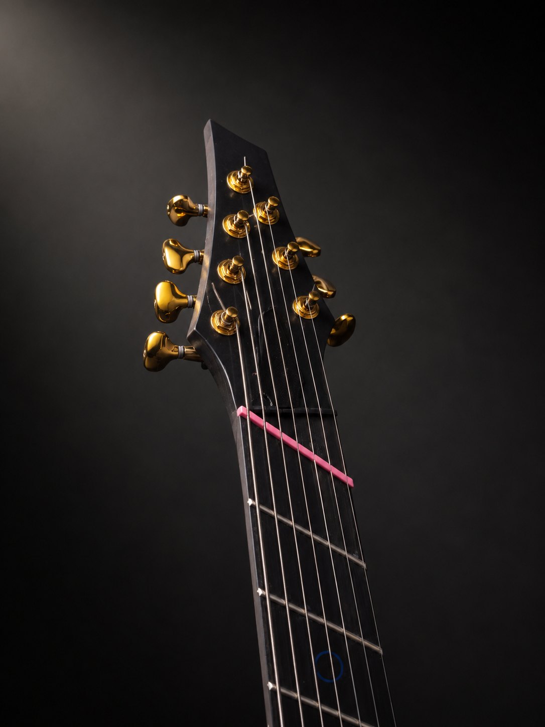 AKO SOMA headstock — gold tuners, multiscale